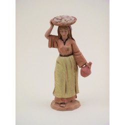 Donna con cesto sulla testa cm 12