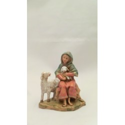 Donna seduta con pecore cm 9,5