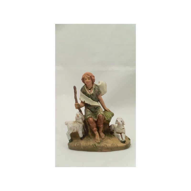 Ragazzo seduto con pecore cm 9,5