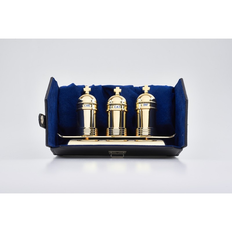 Tre vasetti vintage oli santi su vassoio in astuccio