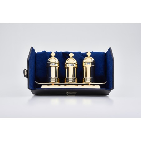 Tre vasetti vintage oli santi su vassoio in astuccio