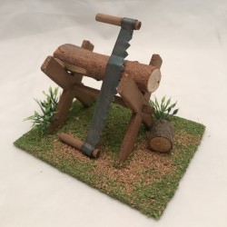 Treppiede con legna e sega