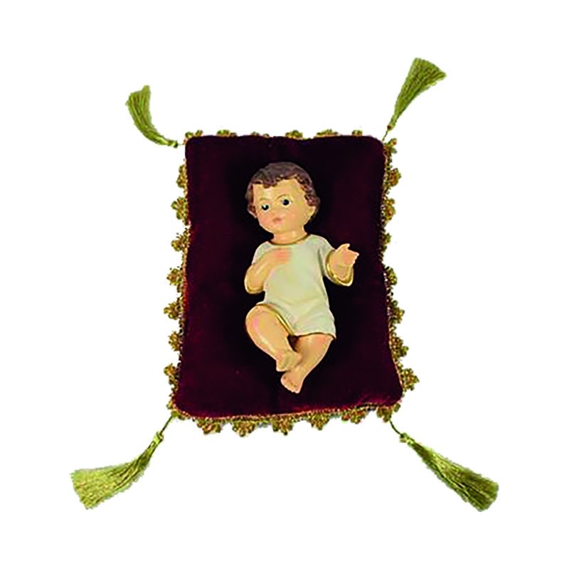 cm. 15 Bambino in resina su cuscino
