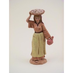 Donna con cesto sulla testa cm 12