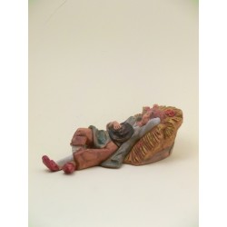 Ragazzo che dorme su paglia cm 19