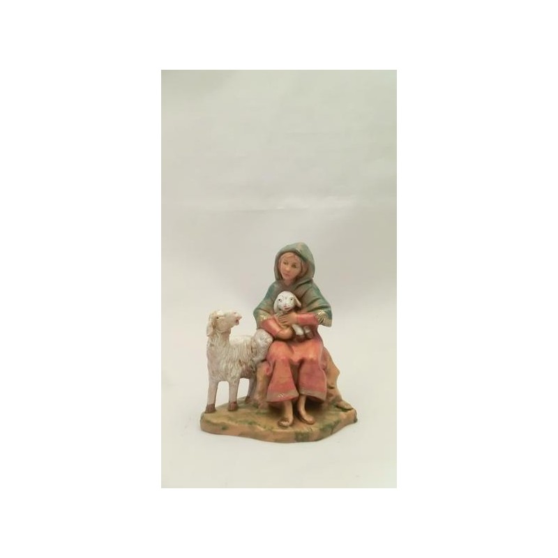 Donna seduta con pecore cm 9,5