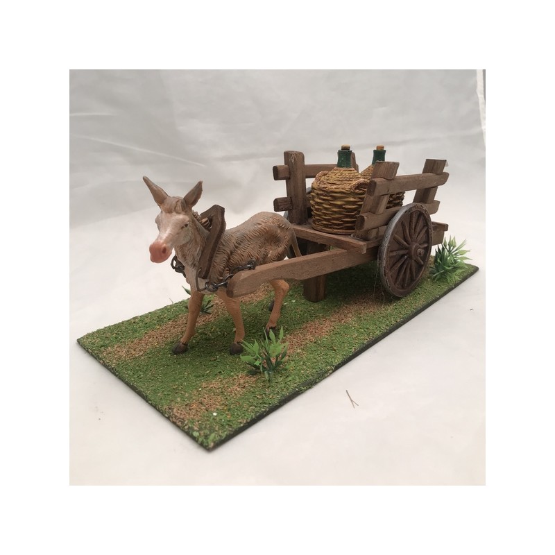Asino con carretto e damigiane