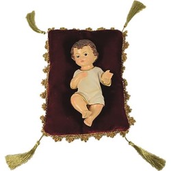 cm. 8 Bambino in resina su cuscino