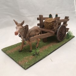 Asino con carretto e damigiane